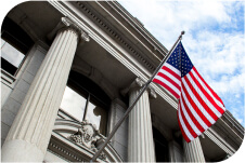 A government building with an American flag.